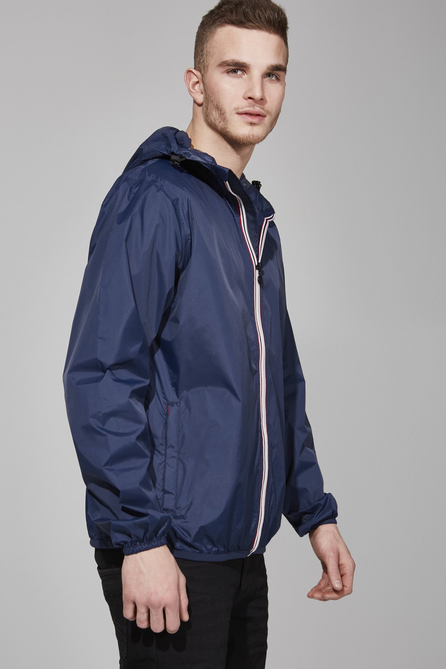 Navy full zip packable rain jacket and windbreaker