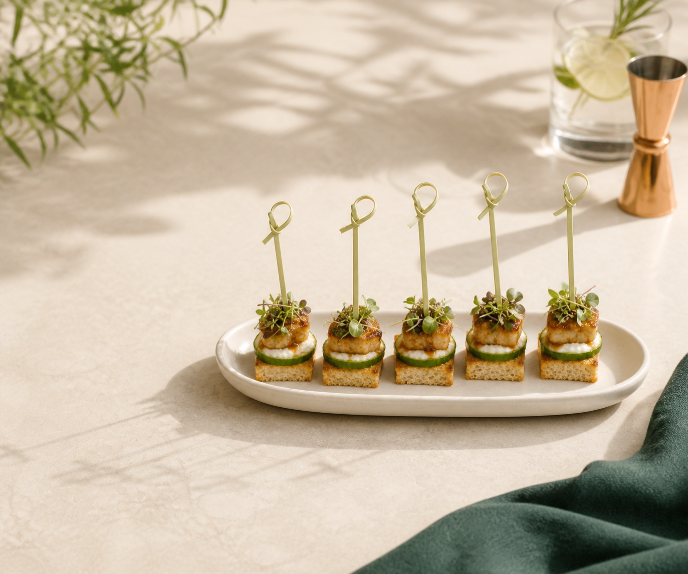 Uncommon bamboo knot cocktail picks in a canapé service scene